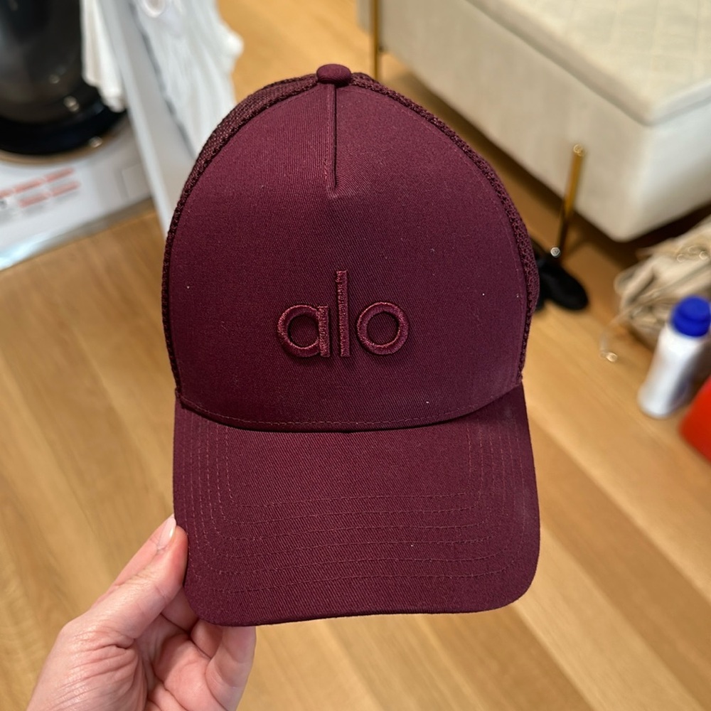 ALO burgundy “district trucker hat”